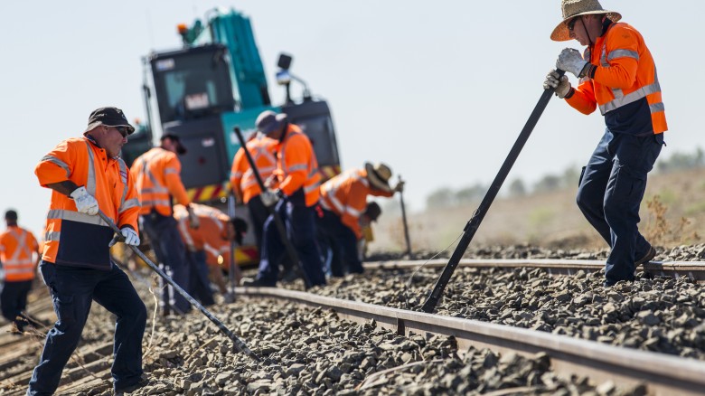 Workers doing trackwork on a country rail network